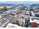 A high aerial view showing the condo complex near the ocean with city views, and parking at 1238 E Kennedy Blvd # 702, Tampa, FL 33602