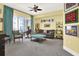 Bright living room featuring a seating area and a balcony with city views at 1238 E Kennedy Blvd # 702, Tampa, FL 33602