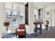 Lobby with interior decor, leather chair, and views of the complex pool through the window at 1238 E Kennedy Blvd # 702, Tampa, FL 33602