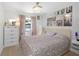 Charming bedroom with a comfortable bed, soft lighting, and stylish decor at 14007 Middleton Way, Tampa, FL 33624