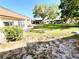 Spacious backyard showcasing a lovely patio area perfect for relaxing and entertaining guests at 1473 Feather Dr # 1473, Clearwater, FL 33759