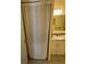 Small bathroom with sink, toilet, and shower behind a white curtain at 1473 Feather Dr # 1473, Clearwater, FL 33759