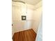 Walk-in closet with installed shelving and hardwood flooring at 1473 Feather Dr # 1473, Clearwater, FL 33759