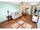 Inviting living space with hardwood floors, neutral decor, and lots of natural light at 1473 Feather Dr # 1473, Clearwater, FL 33759