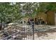 Outdoor patio with ample seating area with mature trees and a tranquil setting at 14809 Ninebark Ct, Land O Lakes, FL 34638