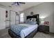 Comfortable bedroom features stylish furnishings, including a padded bedframe and plush throw at 14809 Ninebark Ct, Land O Lakes, FL 34638