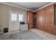 Bedroom featuring a built-in wardrobe and shelving units, offering ample storage space at 14809 Ninebark Ct, Land O Lakes, FL 34638