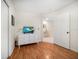 Neutral-toned bedroom featuring a modern dresser, TV, and sleek decor for a comfortable stay at 1500 Gulf Blvd # 103B, Indian Rocks Beach, FL 33785