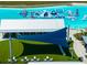 Aerial view of the lagoon water park highlighting recreational area, water features and outdoor lounging at 16810 Trite Bend St, Wimauma, FL 33598