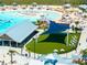 Aerial view of the lagoon showing the outdoor lounging area, beach, and recreation areas for residents at 16810 Trite Bend St, Wimauma, FL 33598
