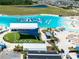 Aerial view of the lagoon's inflatable obstacle course and beach front seating at 16810 Trite Bend St, Wimauma, FL 33598