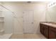 Bathroom with shower and single sink with vanity at 16810 Trite Bend St, Wimauma, FL 33598