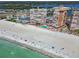 Aerial view of high-rise beachfront condos on a pristine beach with a community pool and lounge area at 17940 Gulf Blvd # 9B, Redington Shores, FL 33708