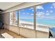 Enjoy breathtaking ocean views from this condo's private balcony featuring a sunny seating area at 17940 Gulf Blvd # 9B, Redington Shores, FL 33708
