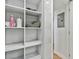 Bathroom shelving with marble accents adds functionality and beauty at 17940 Gulf Blvd # 9B, Redington Shores, FL 33708