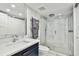 This bathroom has a glass shower and a modern vanity, showcasing contemporary design and practicality at 17940 Gulf Blvd # 9B, Redington Shores, FL 33708