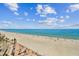 Stunning panoramic view of the ocean and beach from the building's vantage point at 17940 Gulf Blvd # 9B, Redington Shores, FL 33708