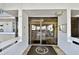 Welcoming building entrance with a clean, modern design and easy access to the lobby at 17940 Gulf Blvd # 9B, Redington Shores, FL 33708