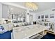 Open concept dining area leading to the kitchen with stainless steel appliances at 17940 Gulf Blvd # 9B, Redington Shores, FL 33708