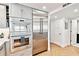 Gourmet kitchen with stainless steel appliances, custom cabinets, and sleek design at 17940 Gulf Blvd # 9B, Redington Shores, FL 33708