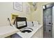 Functional laundry room with well-maintained washers and dryers and organized storage for convenience at 17940 Gulf Blvd # 9B, Redington Shores, FL 33708