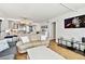 Comfortable living room with an open floor plan to the modern kitchen at 17940 Gulf Blvd # 9B, Redington Shores, FL 33708