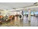 Spacious lobby with tile flooring, comfortable seating, and ocean views, perfect for residents and guests at 17940 Gulf Blvd # 9B, Redington Shores, FL 33708