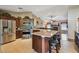 Beautiful kitchen with stainless steel appliances, granite counters, and a breakfast bar with seating at 18533 Avocet Dr, Lutz, FL 33558