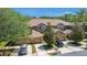 Charming townhome with multiple garages, well-maintained landscaping, and inviting curb appeal at 18981 Duquesne Dr, Tampa, FL 33647