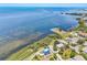 Stunning aerial view of the property showcasing its waterfront location and access to the bay at 228 Shore Dr, Tarpon Springs, FL 34689