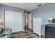 Bedroom with closet and drawer space, an ocean themed aesthetic, and hardwood floors at 228 Shore Dr, Tarpon Springs, FL 34689