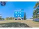 Eye-catching blue house with unique architecture, set on an expansive lawn at 228 Shore Dr, Tarpon Springs, FL 34689