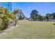 Beautiful lot with palm trees, ready for new construction in a desirable location at 228 Shore Dr, Tarpon Springs, FL 34689