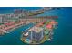 Aerial view of community featuring water views and orange roofs at 240 Sand Key Estates Dr # 58, Clearwater Beach, FL 33767