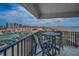 Expansive balcony offering panoramic views of the harbor and city skyline at 240 Sand Key Estates Dr # 58, Clearwater Beach, FL 33767