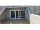 Outdoor patio area leading to waterfront community with nearby stair access at 2424 W Tampa Bay Blvd # A106, Tampa, FL 33607