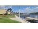 Scenic waterfront views with a swing, docks, and lush landscaping surrounding the condo at 2424 W Tampa Bay Blvd # A106, Tampa, FL 33607