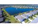 Drone shot of house with tranquil pond, fountain, and neighboring residences at 25317 E Lenox Cir, Punta Gorda, FL 33950
