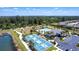 Aerial view of Waterford community amenities including pickleball courts, pool and clubhouse at 25317 E Lenox Cir, Punta Gorda, FL 33950