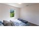 Bedroom featuring a comfortable bed, window with view and soft carpet at 25317 E Lenox Cir, Punta Gorda, FL 33950