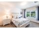 Comfortable bedroom with a view and bright natural light at 25317 E Lenox Cir, Punta Gorda, FL 33950