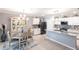 Bright open floor plan featuring a modern kitchen with breakfast nook at 25317 E Lenox Cir, Punta Gorda, FL 33950