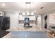 Spacious kitchen boasts a large granite island, modern appliances, and ample cabinet space at 25317 E Lenox Cir, Punta Gorda, FL 33950