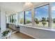 Enclosed balcony offering panoramic views of the golf course and blue skies at 2616 Cove Cay Dr # 301, Clearwater, FL 33760