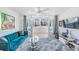 Inviting living room with stylish decor and sliding glass doors to the balcony with a scenic view at 2616 Cove Cay Dr # 301, Clearwater, FL 33760