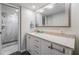 Bright bathroom with a modern vanity and a shower at 2621 Cove Cay Dr # 204, Clearwater, FL 33760