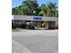 Convenient golf cart parking area at the golf shop and Cove Cay Golf Club, nestled amidst lush green surroundings at 2621 Cove Cay Dr # 204, Clearwater, FL 33760