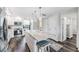 Bright kitchen with white cabinets, stainless steel appliances and a granite island with seating at 2621 Cove Cay Dr # 204, Clearwater, FL 33760