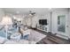 Spacious living room with hardwood floors and modern décor at 2621 Cove Cay Dr # 204, Clearwater, FL 33760