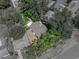 Aerial view of the property with lot lines, showing the home nestled among lush trees at 3001 9Th N Ave, St Petersburg, FL 33713